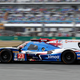Fernando Alonso, of Spain, drives early laps in his Ligier LMP2. AP Photo